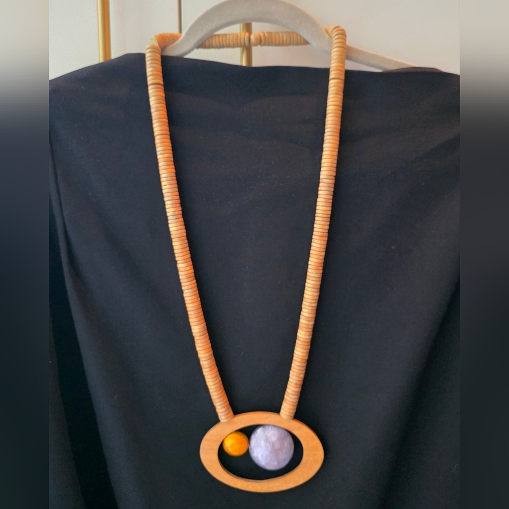 Wooden Beaded Necklace with Playful Space-Age Pendant